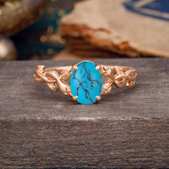 Nature-inspired Botanical Vine Entwined 4-Prong Oval-Cut Turquoise Engagement Ring