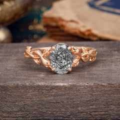 Nature-inspired Botanical Vine Entwined 4-Prong Oval-Cut Black Rutilated Quartz Engagement Ring