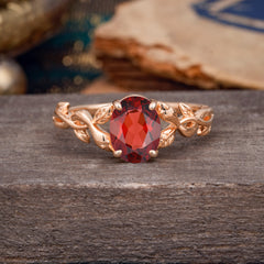 Nature-inspired Botanical Vine Entwined 4-Prong Oval-Cut Garnet Engagement Ring
