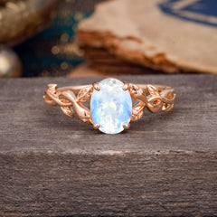 Nature-inspired Botanical Vine Entwined 4-Prong Oval-Cut Moonstone Engagement Ring