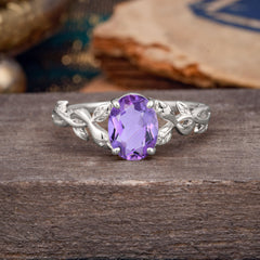 Nature-inspired Botanical Vine Entwined 4-Prong Oval-Cut Amethyst Engagement Ring