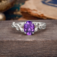 Nature-inspired Botanical Vine Entwined 4-Prong Oval-Cut Amethyst Engagement Ring