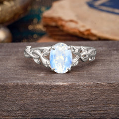 Nature-inspired Botanical Vine Entwined 4-Prong Oval-Cut Moonstone Engagement Ring