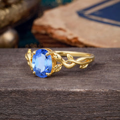 Nature-inspired Botanical Vine Entwined 4-Prong Oval-Cut Sapphire Engagement Ring