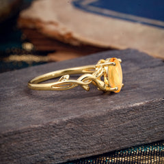Nature-inspired Botanical Vine Entwined 4-Prong Oval-Cut Citrine Engagement Ring