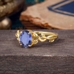 Nature-inspired Botanical Vine Entwined 4-Prong Oval-Cut Tanzanite Engagement Ring