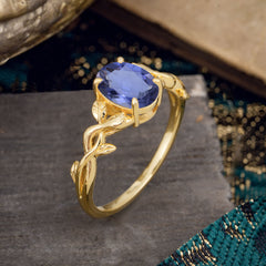 Nature-inspired Botanical Vine Entwined 4-Prong Oval-Cut Tanzanite Engagement Ring