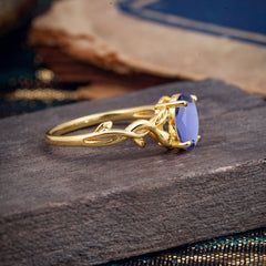 Nature-inspired Botanical Vine Entwined 4-Prong Oval-Cut Tanzanite Engagement Ring