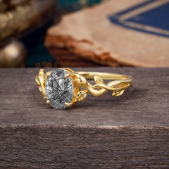 Nature-inspired Botanical Vine Entwined 4-Prong Oval-Cut Black Rutilated Quartz Engagement Ring