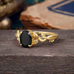 Nature-inspired Botanical Vine Entwined 4-Prong Oval-Cut Black Onyx Engagement Ring