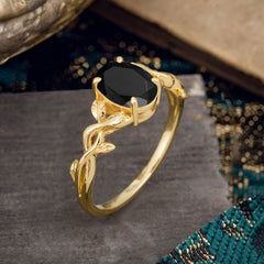 Nature-inspired Botanical Vine Entwined 4-Prong Oval-Cut Black Onyx Engagement Ring
