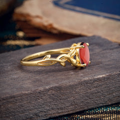 Nature-inspired Botanical Vine Entwined 4-Prong Oval-Cut Garnet Engagement Ring