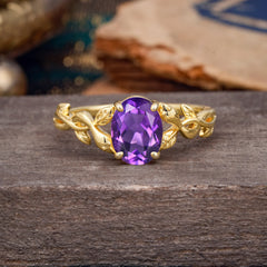 Nature-inspired Botanical Vine Entwined 4-Prong Oval-Cut Amethyst Engagement Ring