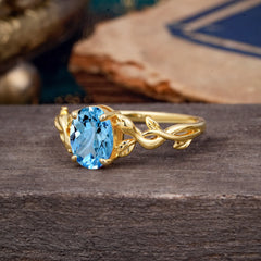 Nature-inspired Botanical Vine Entwined 4-Prong Oval-Cut Aquamarine Engagement Ring