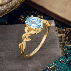 Nature-inspired Botanical Vine Entwined 4-Prong Oval-Cut Aquamarine Engagement Ring