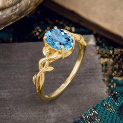 Nature-inspired Botanical Vine Entwined 4-Prong Oval-Cut Aquamarine Engagement Ring