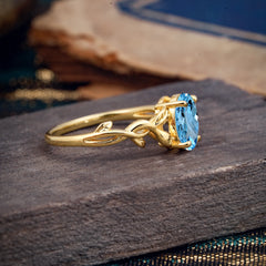 Nature-inspired Botanical Vine Entwined 4-Prong Oval-Cut Aquamarine Engagement Ring