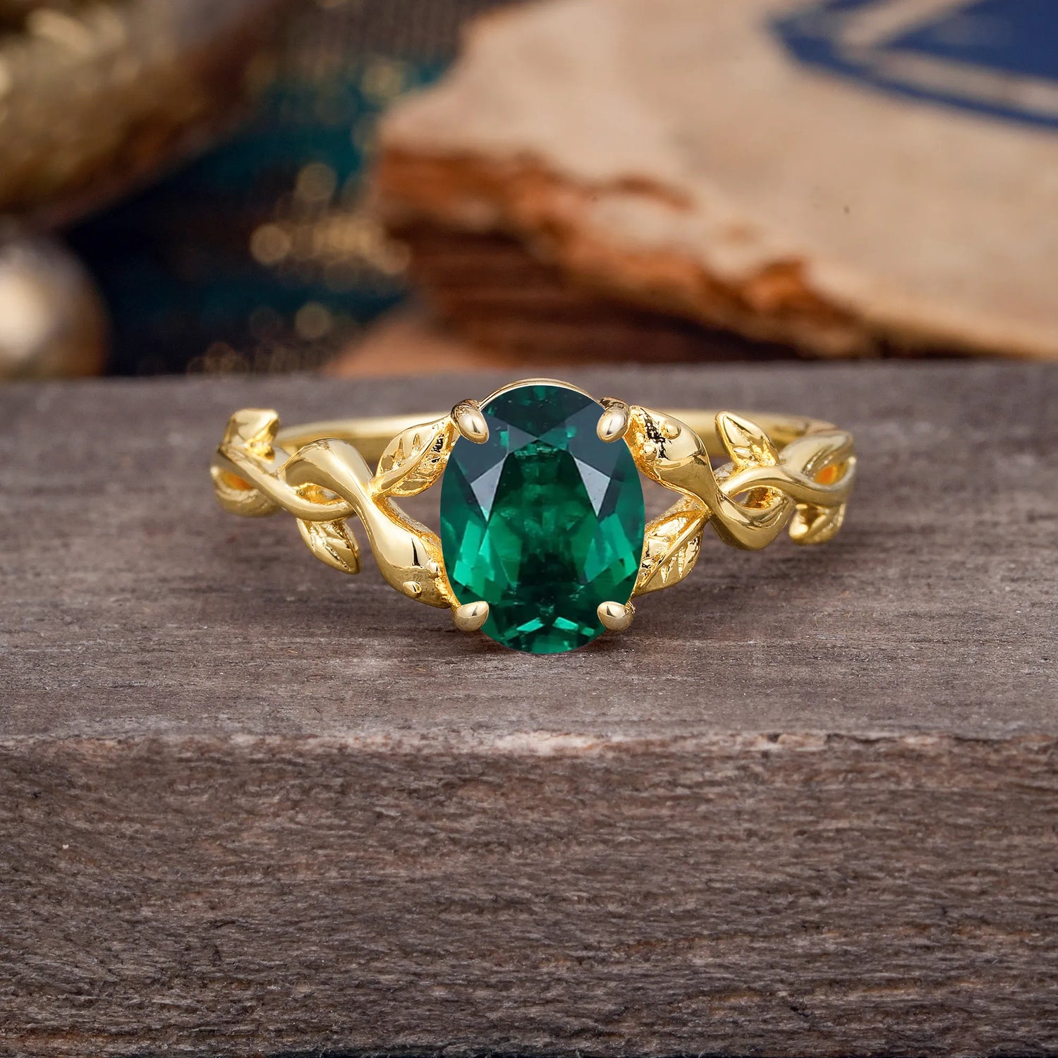 Nature-inspired Botanical Vine Entwined 4-Prong Oval-Cut Emerald Engagement Ring