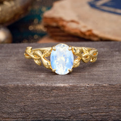 Nature-inspired Botanical Vine Entwined 4-Prong Oval-Cut Moonstone Engagement Ring