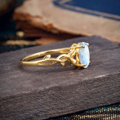Nature-inspired Botanical Vine Entwined 4-Prong Oval-Cut Moonstone Engagement Ring