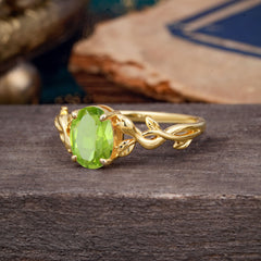 Nature-inspired Botanical Vine Entwined 4-Prong Oval-Cut Peridot Engagement Ring