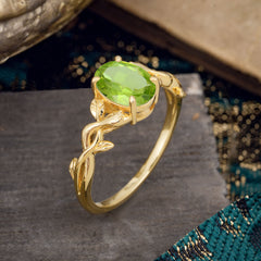 Nature-inspired Botanical Vine Entwined 4-Prong Oval-Cut Peridot Engagement Ring