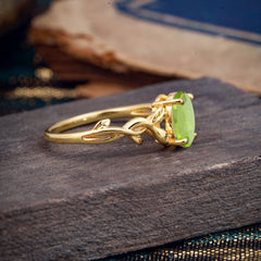 Nature-inspired Botanical Vine Entwined 4-Prong Oval-Cut Peridot Engagement Ring