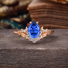 Nature and Moon-Inspired 4-Prong Pear-Cut Sapphire Engagement Ring