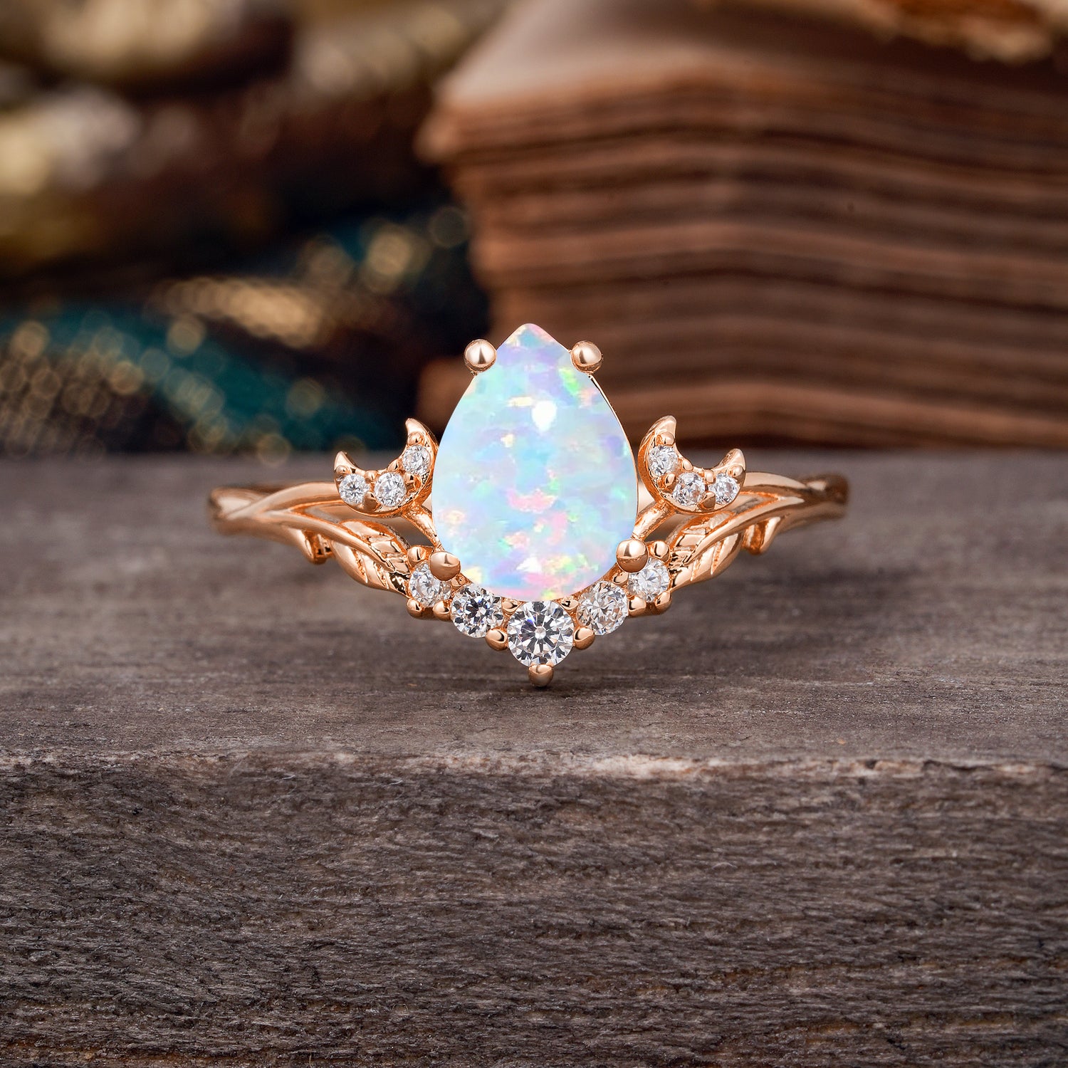 Nature and Moon-Inspired 4-Prong Pear-Cut Opal Engagement Ring