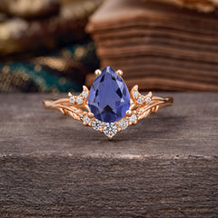 Nature and Moon-Inspired 4-Prong Pear-Cut Natural Tanzanite Engagement Ring