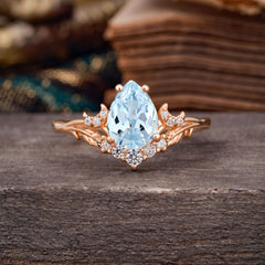 Nature and Moon-Inspired 4-Prong Pear-Cut Aquamarine Engagement Ring