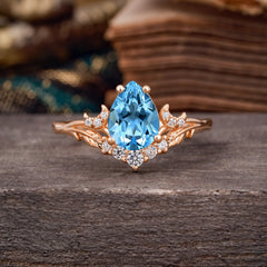 Nature and Moon-Inspired 4-Prong Pear-Cut Aquamarine Engagement Ring