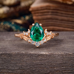 Nature and Moon-Inspired 4-Prong Pear-Cut Emerald Engagement Ring
