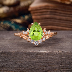 Nature and Moon-Inspired 4-Prong Pear-Cut Natural Peridot Engagement Ring