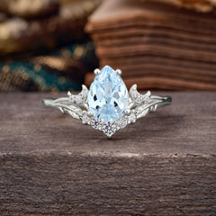 Nature and Moon-Inspired 4-Prong Pear-Cut Aquamarine Engagement Ring