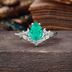Nature and Moon-Inspired 4-Prong Pear-Cut Emerald Engagement Ring