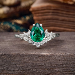 Nature and Moon-Inspired 4-Prong Pear-Cut Emerald Engagement Ring