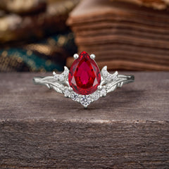 Nature and Moon-Inspired 4-Prong Pear-Cut Ruby Engagement Ring