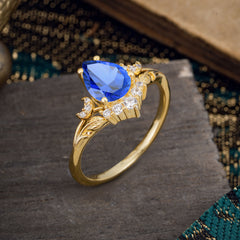 Nature and Moon-Inspired 4-Prong Pear-Cut Sapphire Engagement Ring