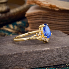 Nature and Moon-Inspired 4-Prong Pear-Cut Sapphire Engagement Ring