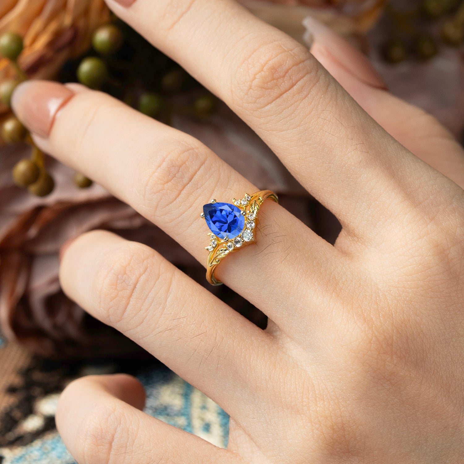 Nature and Moon-Inspired 4-Prong Pear-Cut Sapphire Engagement Ring