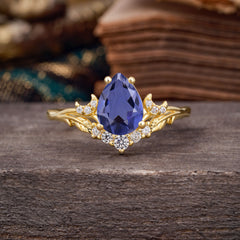 Nature and Moon-Inspired 4-Prong Pear-Cut Natural Tanzanite Engagement Ring