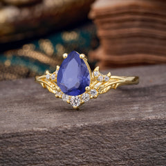 Nature and Moon-Inspired 4-Prong Pear-Cut Natural Tanzanite Engagement Ring