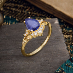 Nature and Moon-Inspired 4-Prong Pear-Cut Natural Tanzanite Engagement Ring