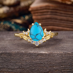 Nature and Moon-Inspired 4-Prong Pear-Cut Turquoise Engagement Ring