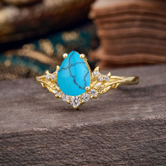 Nature and Moon-Inspired 4-Prong Pear-Cut Turquoise Engagement Ring