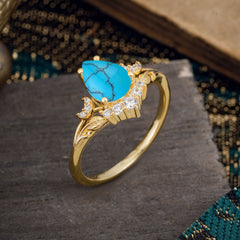 Nature and Moon-Inspired 4-Prong Pear-Cut Turquoise Engagement Ring