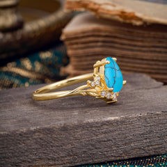 Nature and Moon-Inspired 4-Prong Pear-Cut Turquoise Engagement Ring