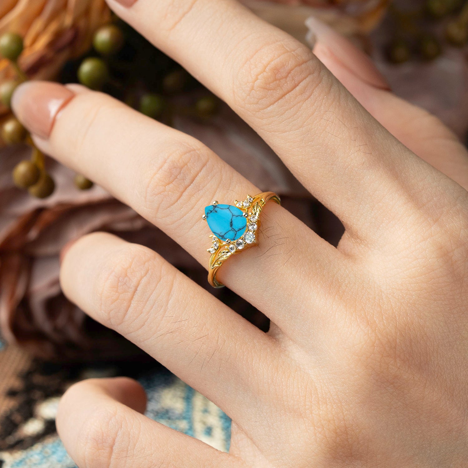 Nature and Moon-Inspired 4-Prong Pear-Cut Turquoise Engagement Ring
