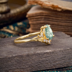Nature and Moon-Inspired 4-Prong Pear-Cut Natural Moss Agate Engagement Ring